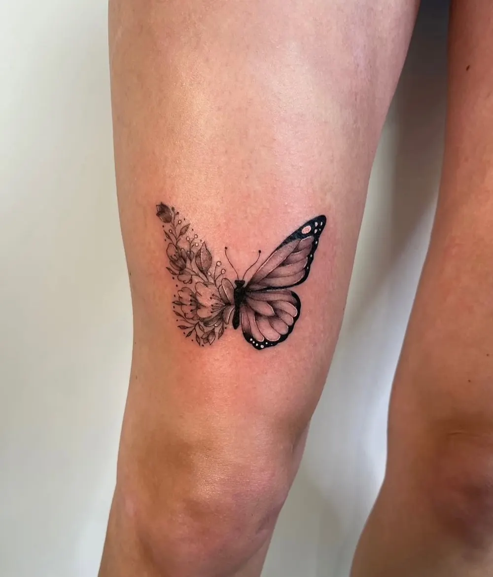 Fineline-Schmetterling am Arm